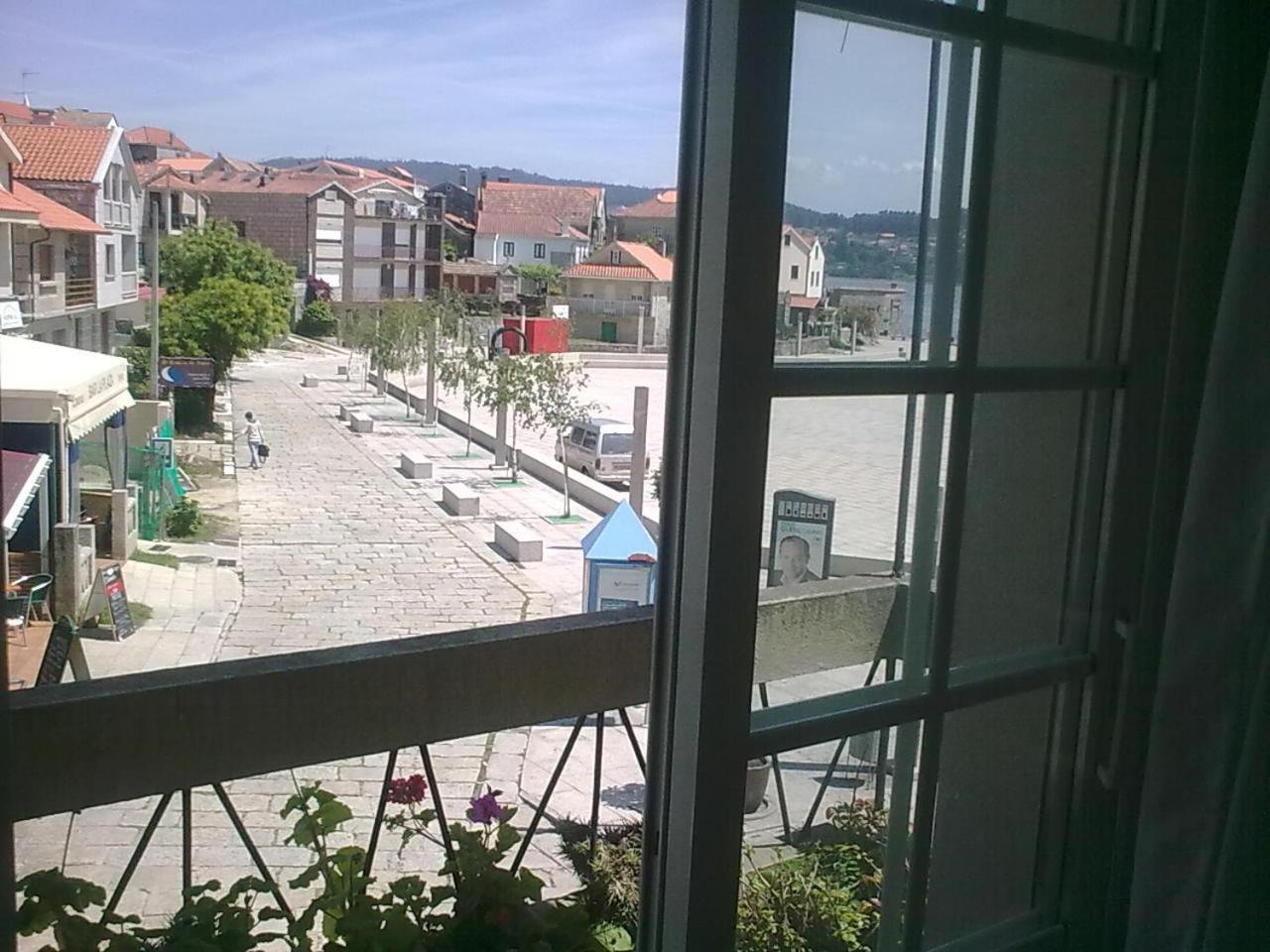 Hogar Del Puerto Hotel Комбаро Екстериор снимка